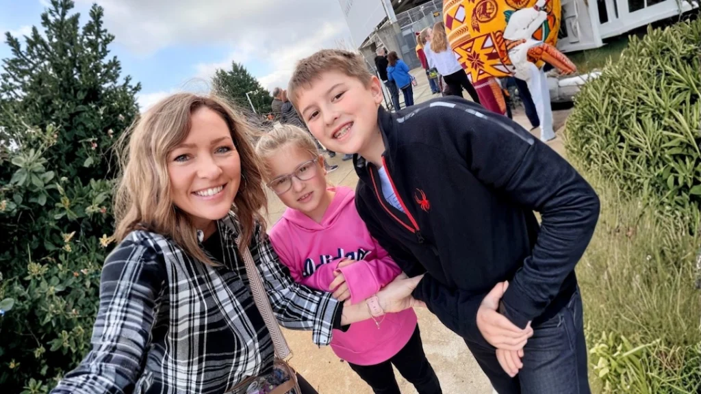 Jennifer Sakowski spending quality time with her children during a football game